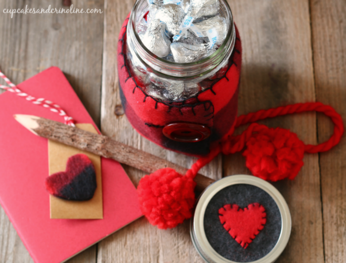 Valentine's Day mason jar filled with kisses - Buffalo check cozy with red pom poms - cupcakesandcrinoline.com 700 x 532